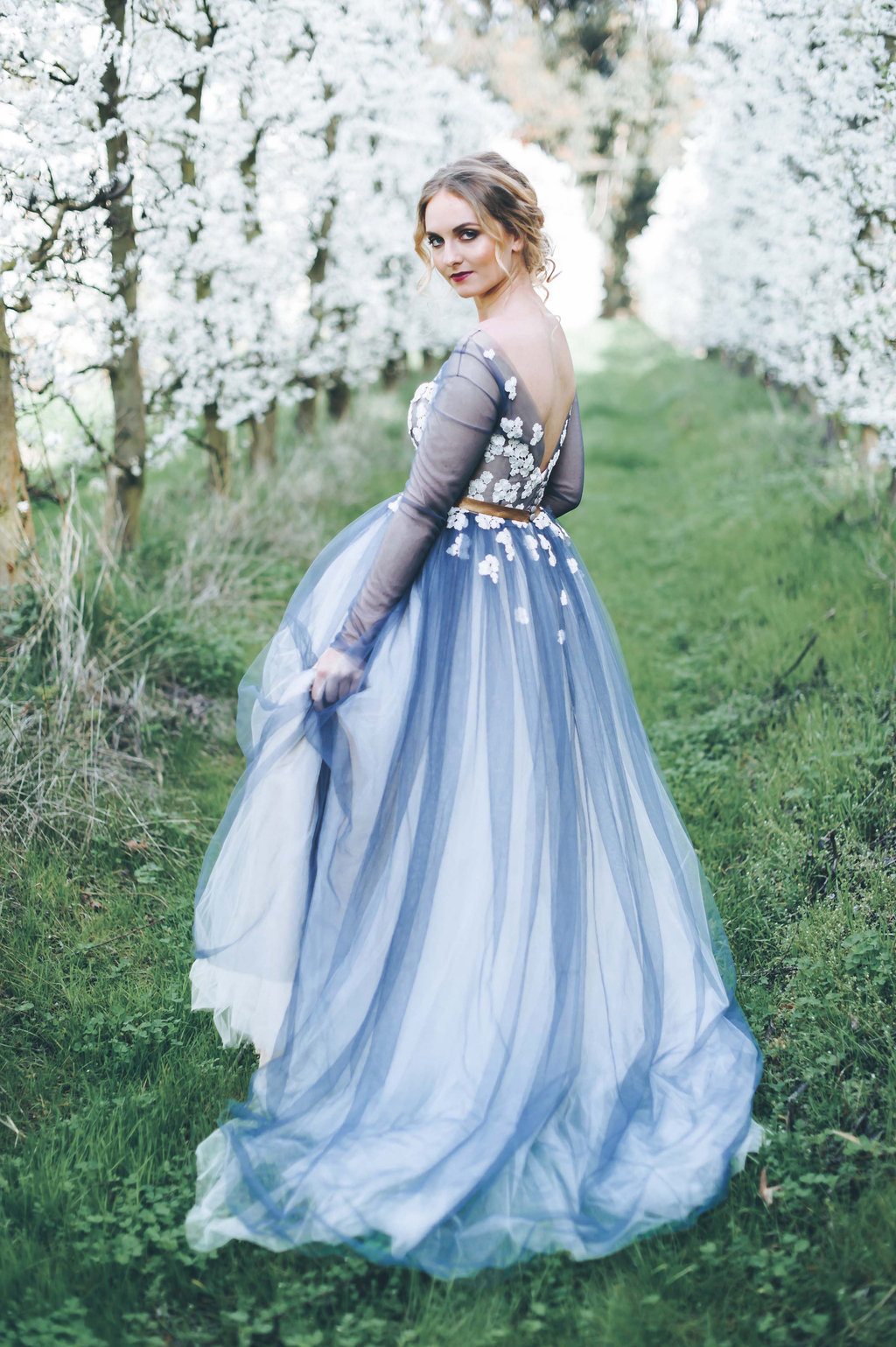 wedding gown with blue accent
