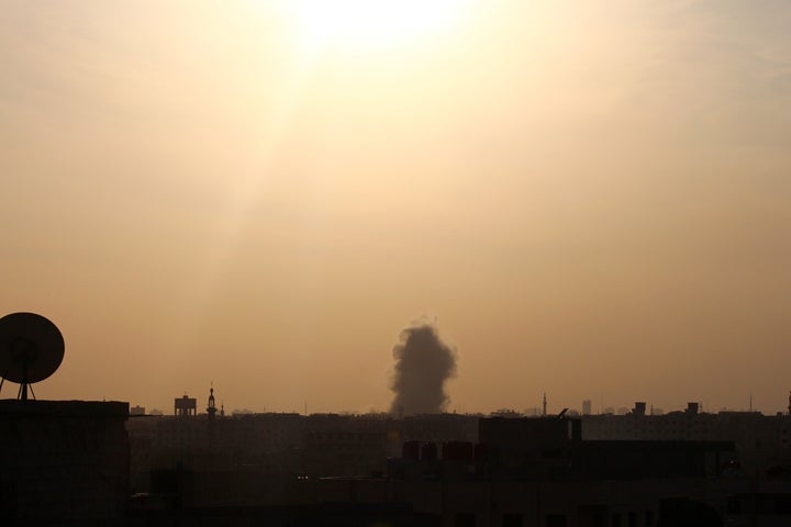 Smoke rises over Douma. 