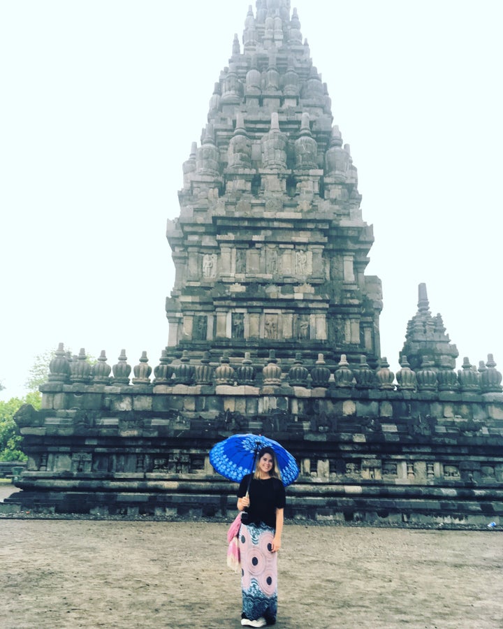 Caught in a gentle rain shower at Prambanan Temple in Yogyakarta, Indonesia.