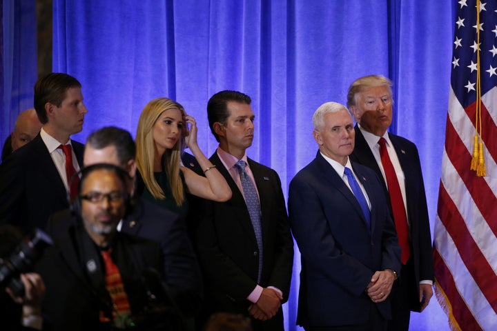 U.S. President-elect Donald Trump stands with Vice President-elect Mike Pence, his sons Donald Trump Jr. and Eric Trump and daughter Ivanka during a news conference in the lobby of Trump Tower in Manhattan, New York City, U.S., January 11, 2017.