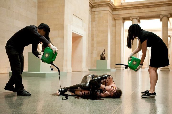 Artists from Liberate Tate performance at London’s Tate Britain gallery at the anniversary of the BP oil spill in the Gulf of Mexico. 