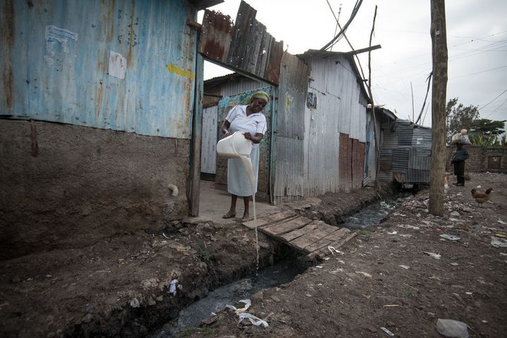 Margaret Mumbua, 46, cleans her home in one of Nairobi's biggest informal settlements.