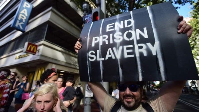 Protesters block a street in Portland, Oregon, during a nationwide day of protests in September against prison conditions. Th