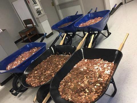 Nick Stafford's five wheelbarrows full of loose coins.