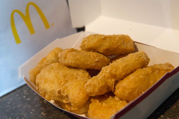 New York City police say a 13-year-old girl stood down an armed assailant demanding one of her Chicken McNuggets.