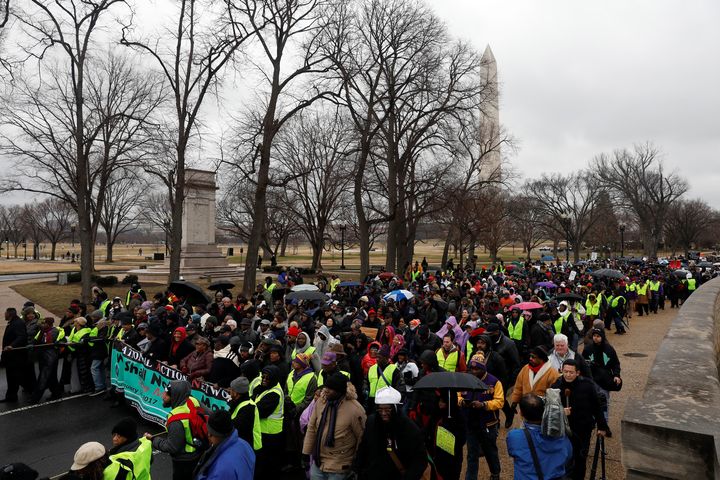 Activists march during the National Action Network's "We Shall Not Be Moved" march in Washington, DC, U.S., January 14, 2017.