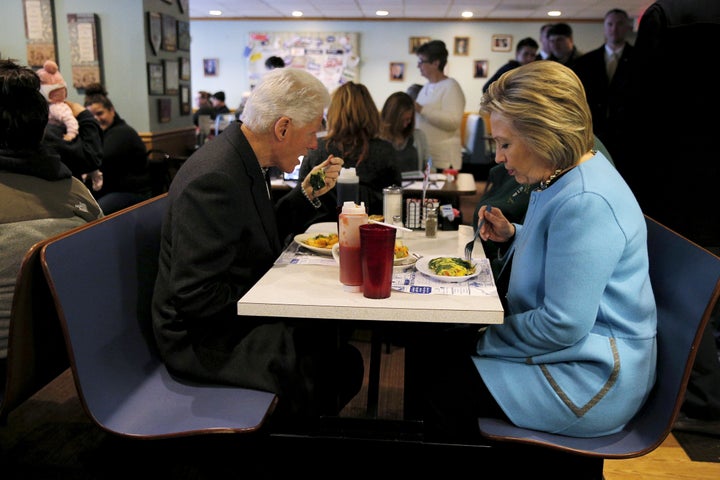 Democratic presidential candidate Hillary Clinton and her husband, former U.S. President Bill Clinton eat breakfast at the Chez Vachon restaurant in Manchester, New Hampshire February 8, 2016.