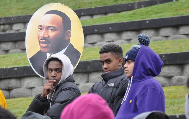 Black youth attending a Dr. Martin Luther King, Jr. march in 2015.