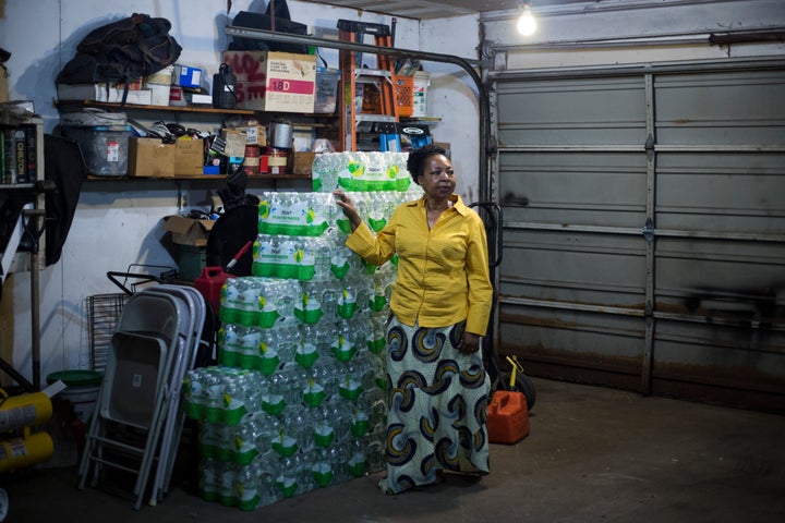 Darlene McClendon, 62, with a stockpile of bottled water at her home in Flint, Michigan, on October 11, 2016. McClendon, a 6th grade teacher, said the water crisis has only made her worry more for the future of her students.