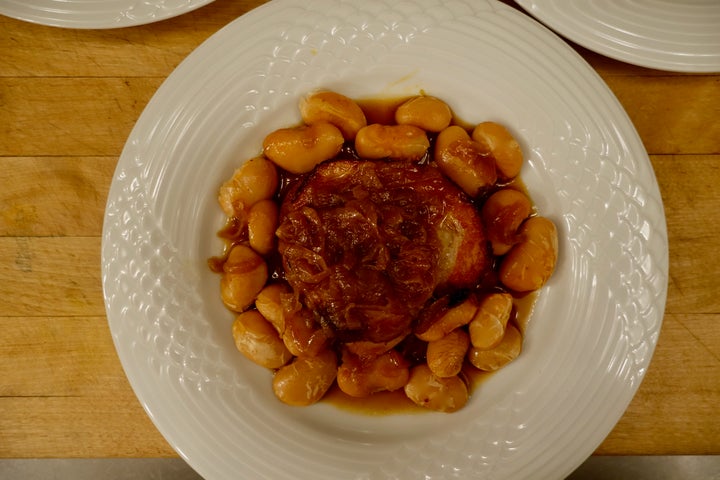 <p>Braised pork belly with onions and ’nduja beans</p>