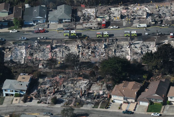Dozens of homes sit destroyed by a massive explosion and fire September 10, 2010 in San Bruno, California. Thirty eight homes were destroyed and four people were killed when a Pacific Gas and Electric gas main blew up in a San Bruno, California neighborhood near San Francisco International Airport on Thursday evening. (Photo by Justin Sullivan/Getty Images)