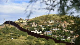 The residential neighbourhood of Nogales in the state of Sonora on the Mexico side of the border is seen across the border wall from Nogales, Arizona on October 12, 2016. 
US Republican presidential candidate Donald Trump has said during his campaign he wants to build a great wall along the 2,000 mile US-Mexico border and make Mexico pay for it.   / AFP / Frederic J. BROWN        (Photo credit should read FREDERIC J. BROWN/AFP/Getty Images)
