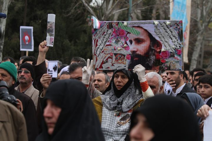 Worshipers attend a rally to protest the execution of Sheikh Nimr al-Nimr in Tehran, Iran.