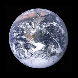 Cernan's crew captured this iconic "blue marble" shot of the Earth en route to the moon.