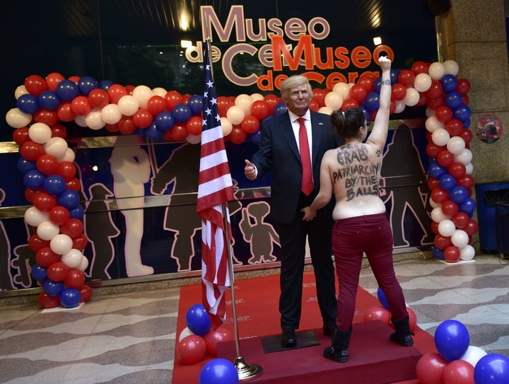 A topless feminist activist grabbed a Donald Trump waxwork in the crotch area during its unveiling at the Madrid Wax Museum on Tuesday.