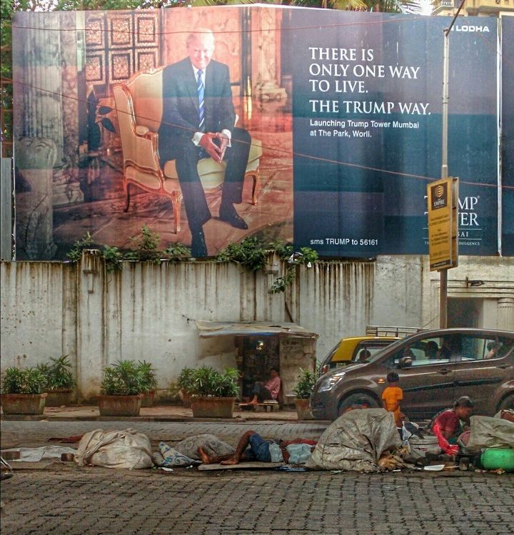 Trump towers over street kids in Mumbai, India by Paul Needham. (If you were curious, this terrifying photo has been authenticated.)
