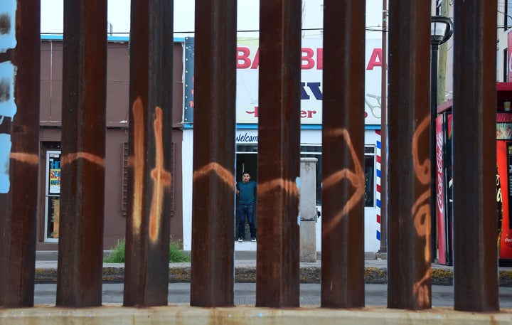 This section of border fencing in Nogales, Arizona, is built of a series of metal beams, which allows Border Patrol agents to