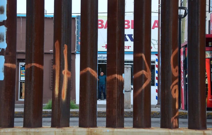 This section of border fencing in Nogales, Arizona, is built of a series of metal beams, which allows Border Patrol agents to see through it.