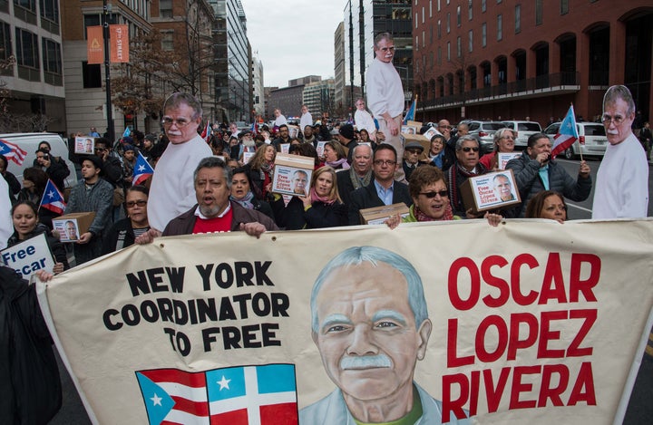 People march to demand the release of Puerto Rican nationalist Oscar Lopez Rivera near the White House in Washington, DC, on