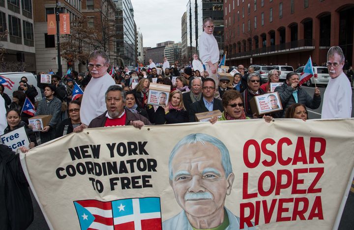 People march to demand the release of Puerto Rican nationalist Oscar Lopez Rivera near the White House in Washington, DC, on Jan. 11, 2017. Obama granted him clemency in his last week of office.