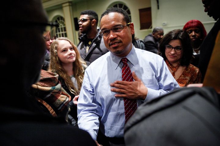Rep. Keith Ellison (D-Minn.) meets supporters after a town hall meeting on Dec. 22, 2016, in Detroit. Seeing Ellison speak there helped win over Michigan Democratic Party chair Brandon Dillon.