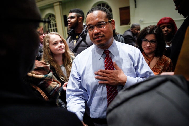 Rep. Keith Ellison (D-Minn.) meets supporters after a town hall meeting on Dec. 22, 2016, in Detroit. Seeing Ellison speak there helped win over Michigan Democratic Party chair Brandon Dillon.