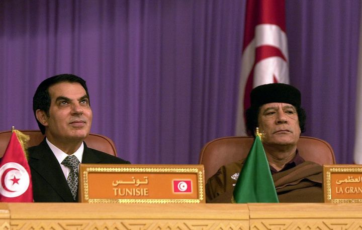 Former Libyan leader Moamar Kadhafi (R) and former Tunisian President Zine El-Abidine Ben Ali pictured in December 2003