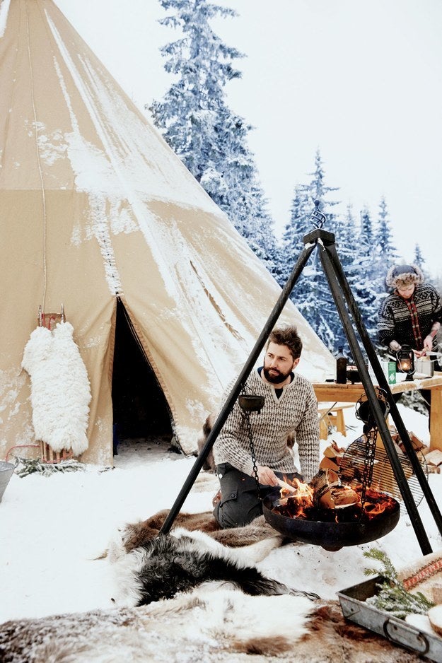 Hygge pros only: cook outdoors, next to your yurt. In the snow.