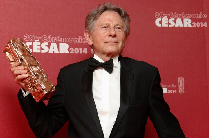 Polanski poses with his Best Director award at the 39th Cesar Awards ceremony in Paris on Feb. 28, 2014.