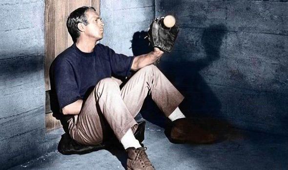 Steve McQueen punished in the 'cooler' cell in 'The Great Escape'