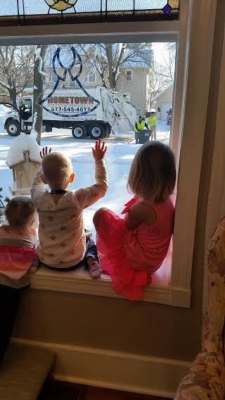 Angie Sevenson's three daughters, who are 2, 3 and 5 years old, adore waving to their local garbage men.