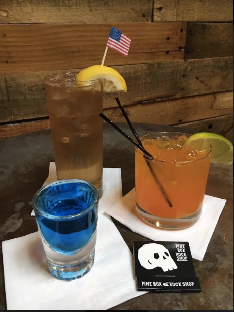 The description for the Golden Shower is "Get your Buzzfeed on with this delicious combination of Buffalo Trace bourbon, Goldschlager, and Regatta Ginger Beer, served over ice in the same style Collins glasses used for our Obama-themed cocktails last Inauguration Day!"