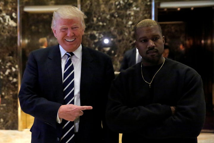 President-elect Donald Trump -- the man who said "look at my African-American over here" during his campaign -- poses with rapper Kanye West at Trump Tower in Manhattan on Dec. 13, 2016.