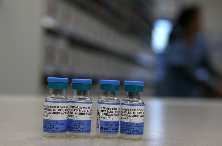 Vials of an MMR vaccine are displayed on a counter at a Walgreens Pharmacy. Numerous large-scale scientific studies