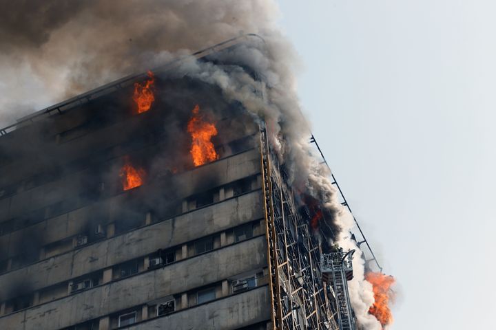 The Plasco building, one of the oldest in Tehran, caught fire on Thursday. Dozens of people were injured.