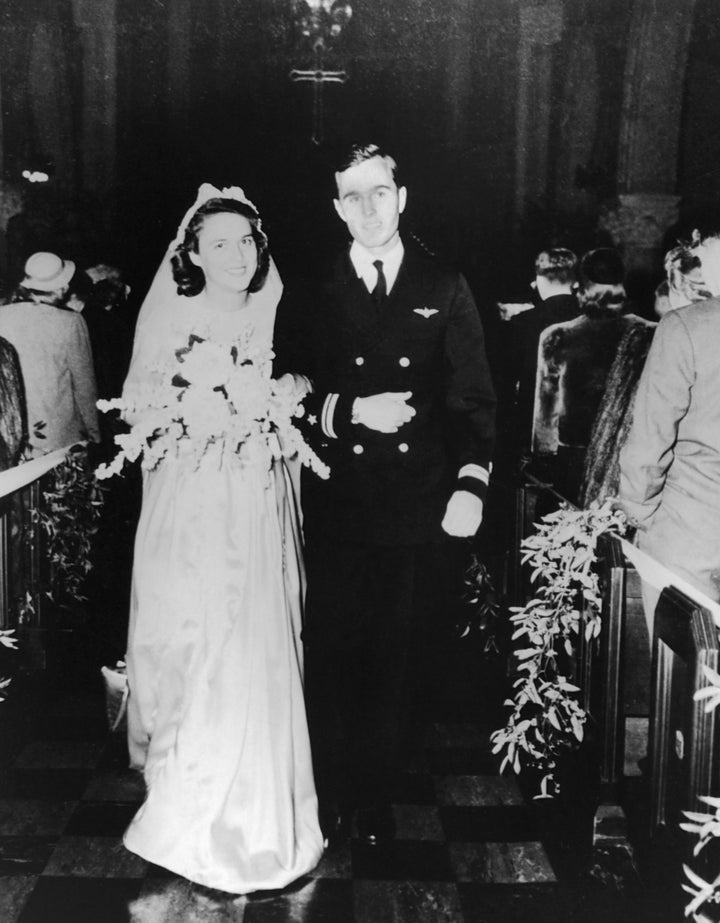 Barbara and George Bush on their wedding day in 1945.