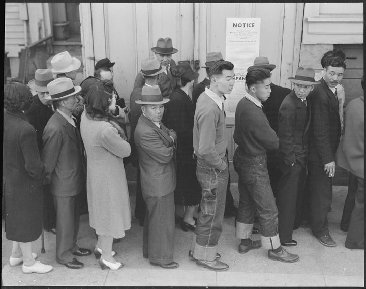 Japanese Americans registering for mass removal in San Francisco, April 1942.