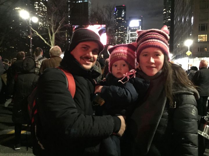 Daniel Valdes, his wife, Dawn Stewart-Lookkin, and their 18-month-old son join thousands of anti-Trump activists in New York City on Thursday.