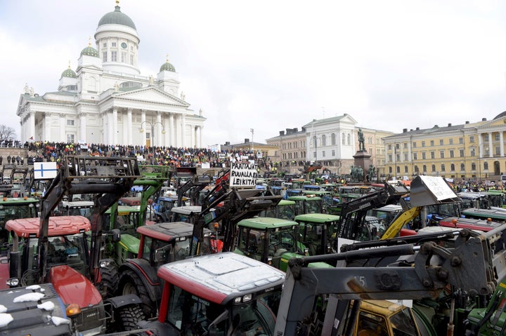 Farmers from different parts of Finland with their tractors participate in a demonstration over declining agricultural earnings in Helsinki, on March 11, 2016.