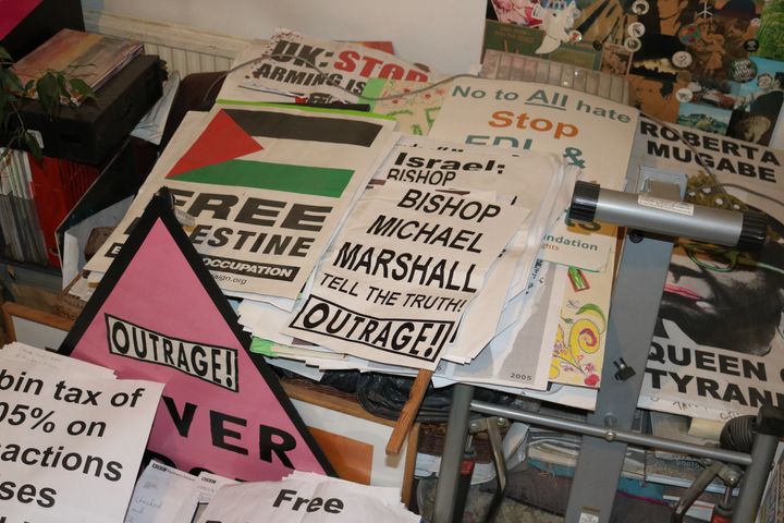 The posters that take up a large part of Peter Tatchell's living room