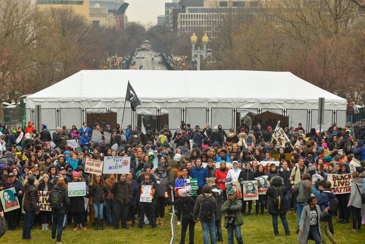 Protesters block an entry point before the inauguration.