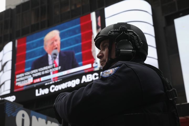A policeman stands guard during the televised inauguration of Donald Trump as the 45th president of the United States, Jan. 20, 2017, in New York City.