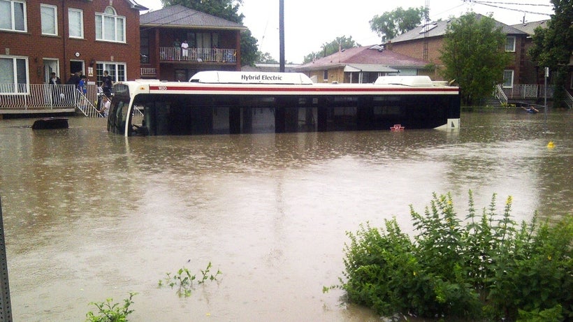 Toronto city bus stuck on a flooded street in the east end of the city.