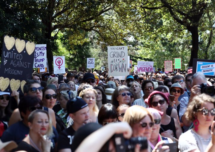 Women protestors march in a rally against President Donald Trump in Sydney, Australia on Saturday