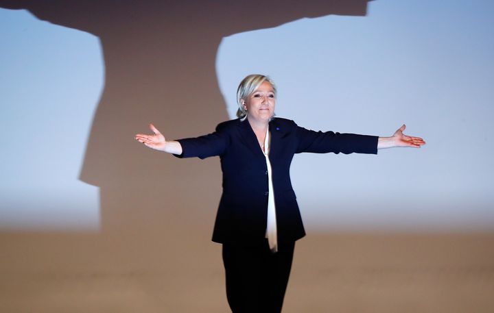 France's National Front leader Marine Le Pen gestures after her speech during a European far-right leaders meeting to discuss about the European Union, in Koblenz, Germany, January 21, 2017.
