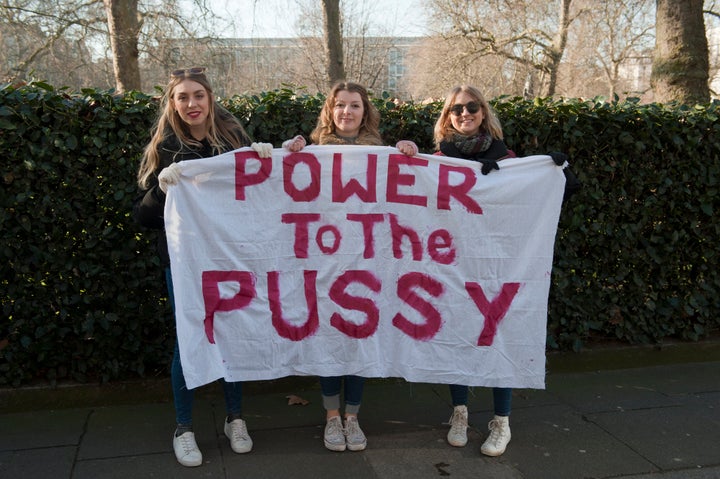 Participants seen during Anti Trump protest on the the first day of Donald Trumps Presidency on January 21, 2017 in London, England.