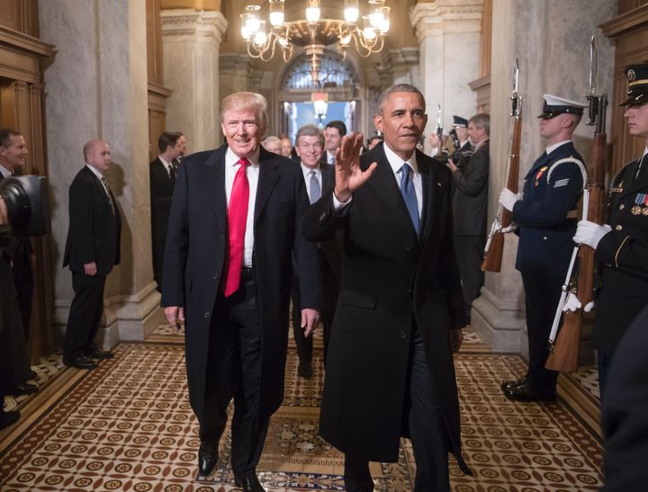 President Donald Trump and former President Barack Obama arrive for Trump's inauguration ceremony on Jan. 20, 2017. Trump kept the citizen petition webpage Obama innovated.