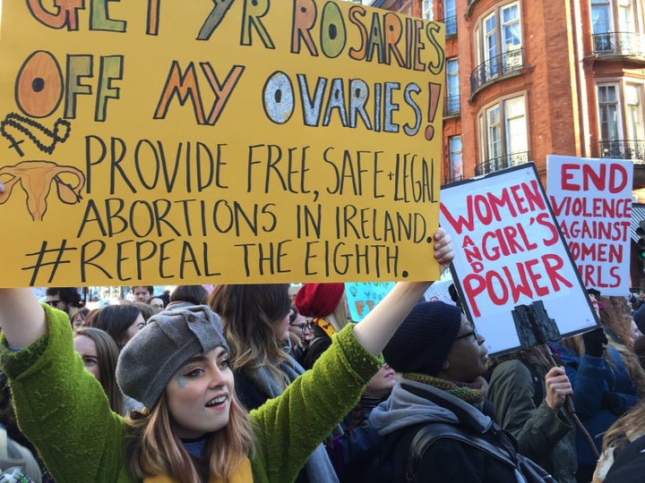 Cara Spelman carried a sign calling for safe and legal access to abortion as she joined thousands of demonstrators at the London Women's March.