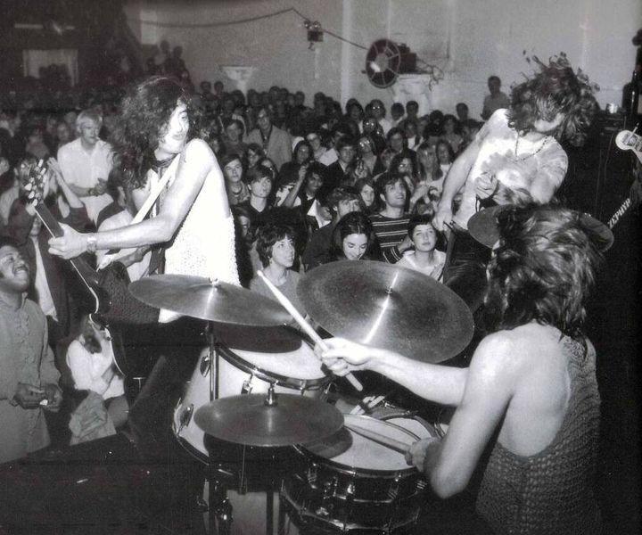 Led Zeppelin in 1969 at at the Boston Tea Party during their first U.S. tour. WBCN announcer (and later MTV VJ) J.J. Jackson at lower left. 