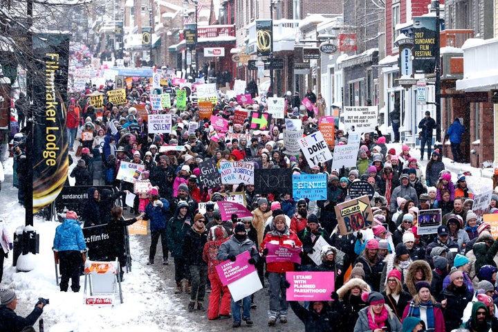 Thousands march down Main Street, one of Sundance's key thoroughfares.